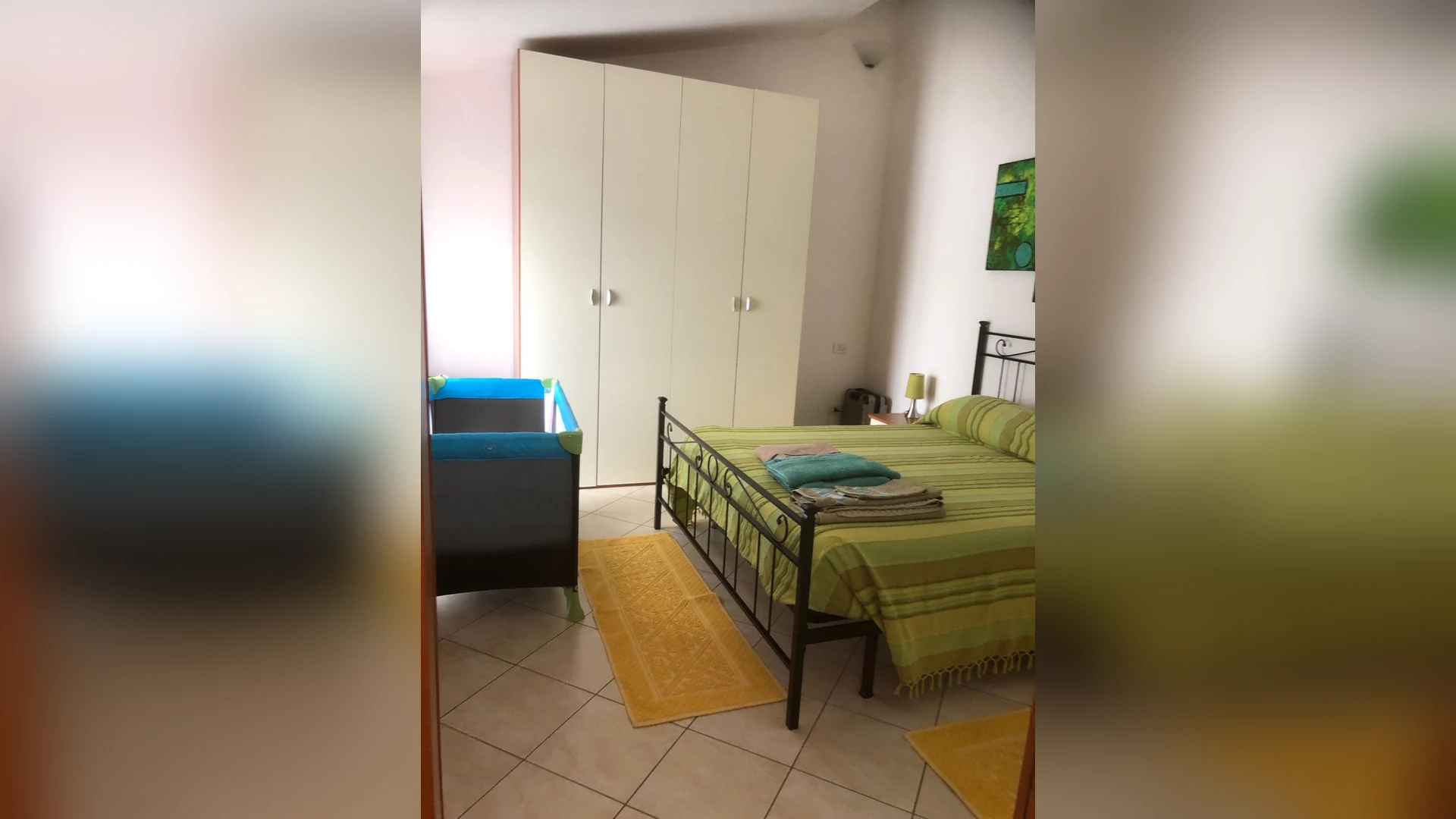 Villa Magnolia — camera con letto matrimoniale e culla